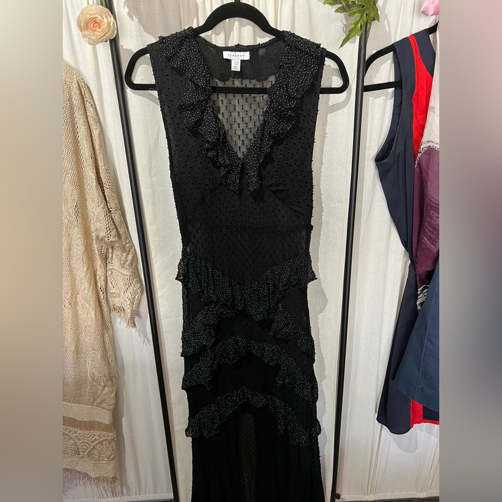 Topshop black black with white polka dots ruffle with front opening at the hem.